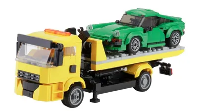 tow Truck with a green Sportcar