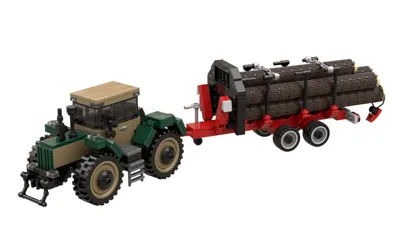 Large agricultural tractor with forestry trailer
